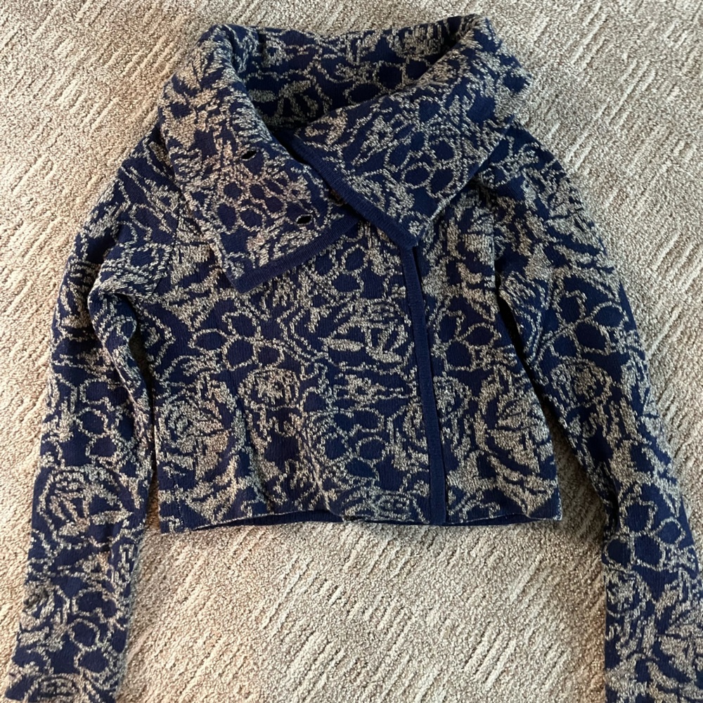Beautiful brocade look knit sweater.